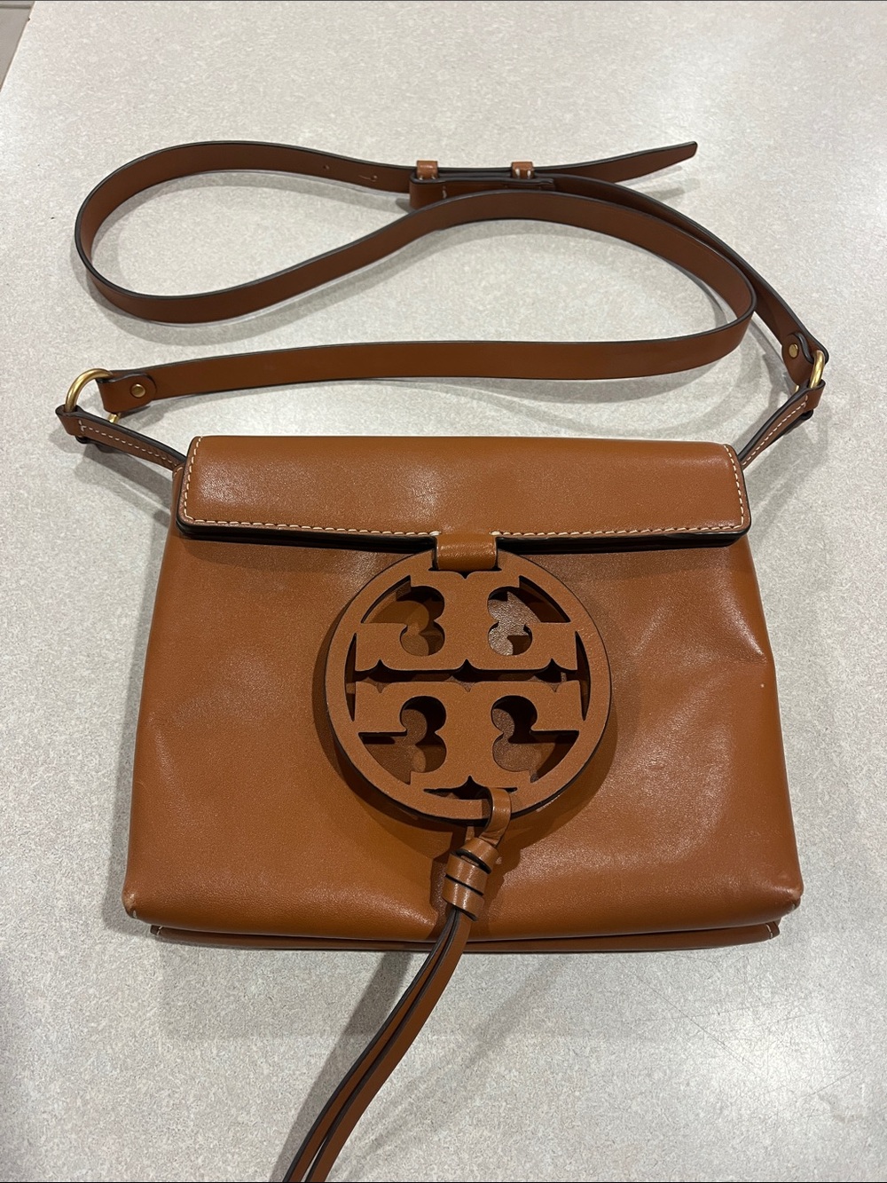 Tory Burch Classic Brown Leather Crossbody with Decorative Medallion